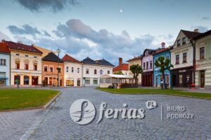 Kezmarok, Slovakia - June 16, 2016: Historic architecture in the old town of Kezmarok. This is the main shopping area of the town with shops, pubs and restaurants.