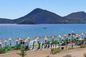 Tolo, Greece October 01 2019, Last bathing tourists in Autumn on the Peloponnese beaches