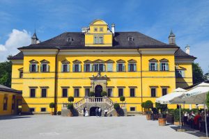 Salzburg, Austria - May 25, 2019 : main facade of Hellbrunn Palace (Schloss Hellbrunn), summer residence of the Archbishop of Salzburg