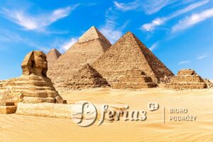 The Sphinx by the Pyramids of Giza in the desert of Egypt.