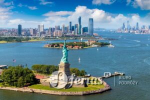 Panoramic aerial view Statue of Liberty and Jersey City and Manhattan cityscape in New York City, NY, USA